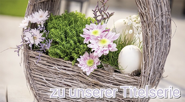 Pflanzkorb: geflochtener Korb mit rosa Blumen, grünen Pflanzen und weißen Dekoeiern als Frühlingsdeko